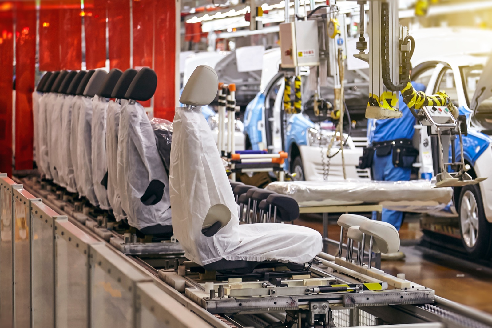 Automotive seat assembly on a moving production line